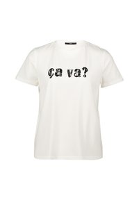 White cotton t-shirt with short sleeves featuring black sequined text “ça va?” on the front. Basic round neckline, relaxed fit.