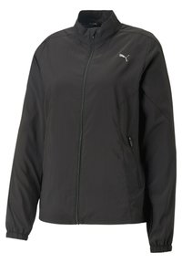 Letterblå jakke i let materiale med opretstående krave, fuld lynlås foran og elastiske manchetter. Har sidelommer med lynlås og et logo på brystet.