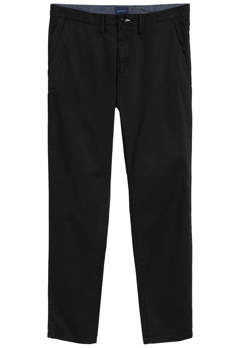 Černé bavlněné chino kalhoty s rovnými předními částmi, dvěma bočními kapsami a klasickým střihem. Dokončené knoflíkovým zapínáním a jemným zdobením pasu.