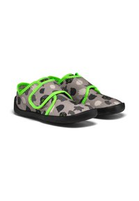 Grey fabric shoes with black and white animal pattern, green accents, adjustable straps, and black rubber soles. Light and flexible design.