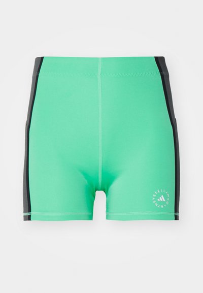 Groene zwemshorts met zwarte accenten aan de zijkant, gemaakt van rekbare stof. Bevat een logo aan de onderkant rechts en platte naden voor comfort.