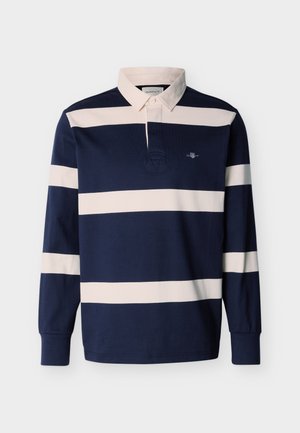 Langärmliges Rugbyshirt mit navyblauen und weißen horizontalen Streifen, beigem Kragen und kleinem besticktem Logo auf der Brust.