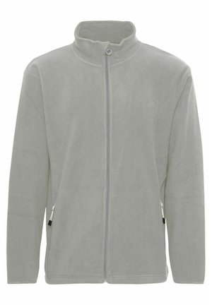 Gai pelēks flīsa jaka ar augstu kaklu, pilnu frontālo rāvējslēdzēju un sānu kabatām ar rāvējslēdzējiem. Mīksta tekstūra un minimālistisks dizains.
