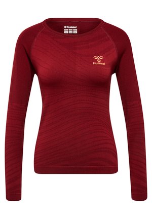 Wiśniowy, dopasowany sportowy sweter z długim rękawem, ozdobiony subtelnymi falistymi wzorami oraz małym beżowym logo Hummel na górnej lewej piersi.