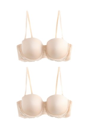 Două sutiene bej căptușite, cu armătură și bordură din dantelă, prevăzute cu bretele subțiri ajustabile, expuse pe un fundal alb.