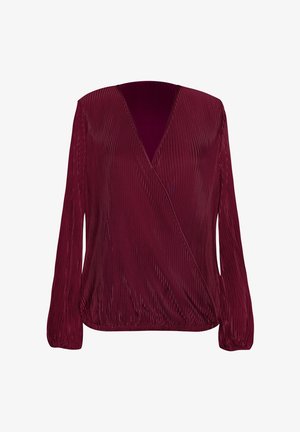 Top largo de manga larga en burdeos con textura plisada, escote en V y dobladillo elástico. Material suave con un acabado liso.