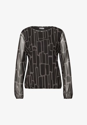 Musta- ja harmaakuvioinen yläosa, jossa pitkät läpikuultavat hihat, pyöreä kaula-aukko ja kuminauhavyötärö. Kuviossa on erikokoisia geometrisia muotoja.