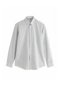 Chemise à manches longues gris clair, boutonnée, avec col pointu et poignets boutonnés, présentée sur un fond blanc uni.