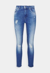Jean skinny en denim bleu clair avec un léger délavage, détails usés sur les jambes, design à cinq poches et fermeture à bouton à la taille.
