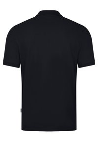 Polo shirt nero a maniche corte con colletto classico, texture liscia e orlo dritto, senza motivi o dettagli visibili.