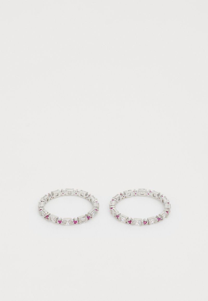 Silver-tone hoop earrings featuring alternating clear and pink rhinestones in a geometric design. Smooth, shiny finish with secure closure.
