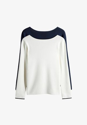 Pitkähihainen villapaita, jossa valkoinen vartalo ja laivastonsininen olkapaneeli. Siinä on leveä kaula-aukko ja kontrastiväriset laivastonsiniset yksityiskohdat kalvosimissa.