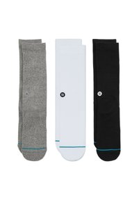 Three pairs of socks: gray, white, and black. Each has a ribbed texture and a small logo. The white and black socks feature a blue accent stripe.