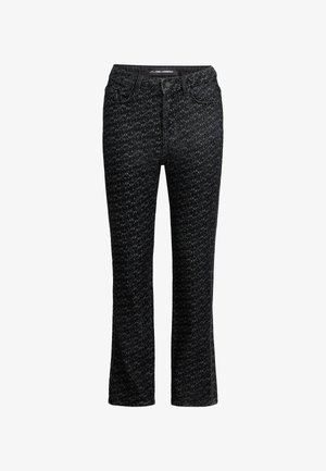 Mustad teksad, millel on tekstuuriga mustriga disain. Omab sobivat taljet, esipocketeid ja sirget sääre lõiget. Valmistatud denimpinnast.