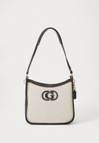 Platnena torba za ramena u krem boji s crnim detaljima, ukrašena zlatnim logotipom, s zaobljenim vrhom i jednom naramenicom. Glatka tekstura na cijeloj površini.