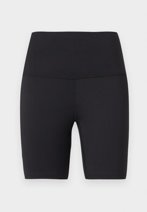 Shorts de vélo noirs taille haute avec coutures plates et longueur mi-cuisse, conçus pour une tenue sportive ou décontractée.