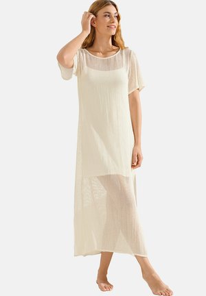 Robe légère et légère de couverture crème, à manches courtes, en tissu texturé et à la silhouette fluide descendant jusqu'aux chevilles.