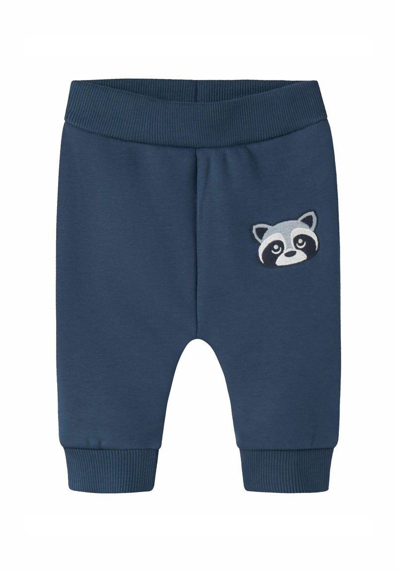 Navyblauwe katoen joggers met een geribbelde tailleband en boorden, voorzien van een geborduurd wasbeer gezicht op de linker bovenbeen.