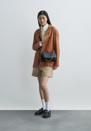 AREN HOBO - Cross body bag - black