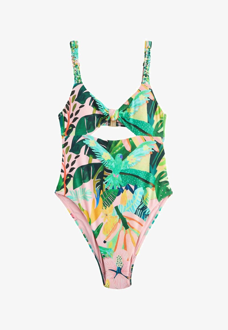 Maillot de bain une pièce avec imprimé feuilles tropicales et oiseaux, détail noué à l'avant, découpe sous la poitrine et bretelles tressées sur fond rose.