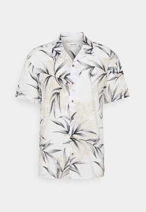 Camisa blanca de manga corta con botones, con patrón de hojas tropicales en negro y beige y un pequeño cuello.