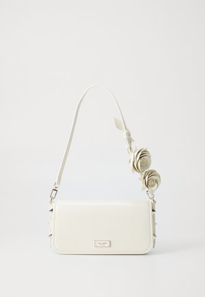 White leather clutch bag with a detachable strap featuring three decorative fabric roses, gold hardware, and a rectangular shape.