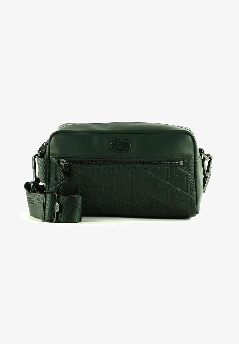 Lacoste Across body bag - sinople/dark green - Zalando