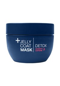 Mörkblå burk med en vit och rosa etikett. Texten anger "Jelly Coat Mask Detox" och ingredienserna "Alginat" och "Koffein." Slät yta.