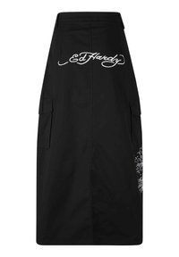 Sort nederdel lavet af bomuld med en mellemlang skæring. Har sidelommer og hvidt broderet "Ed Hardy" logo med intrikate design accenter.