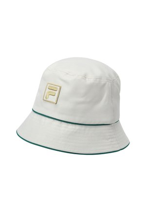 Chapeau bob blanc avec bordure verte sur le bord et un logo carré brodé beige sur le côté.