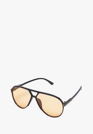 Gianni Kavanagh, Lunettes de soleil - orange