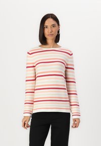 Long-sleeve striped top featuring horizontal lines in red, peach, and cream, made of ribbed fabric with a round neckline.