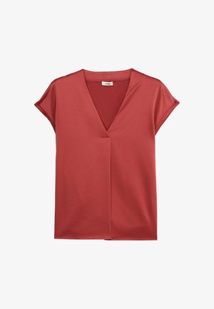 Bluză roșu-oxid cu mâneci scurte și decolteu adânc în V, fabricată dintr-un material neted și ușor lucios, cu un eticheta mică în interiorul gulerului care spune "oltre."