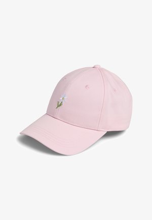 Casquette de baseball rose clair avec une petite marguerite blanche brodée et une tige verte sur le devant.