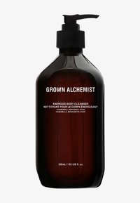 Mörk bärnstenen pumpflaska med matt yta, märkt "Grown Alchemist Energize Body Cleanser." Innehåller 300 mL; inkluderar kamomill, bergamot och ros.