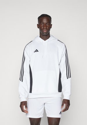 White hooded sweatshirt with black side panels and three black stripes on sleeves. Contains a front pocket and features the Adidas logo.