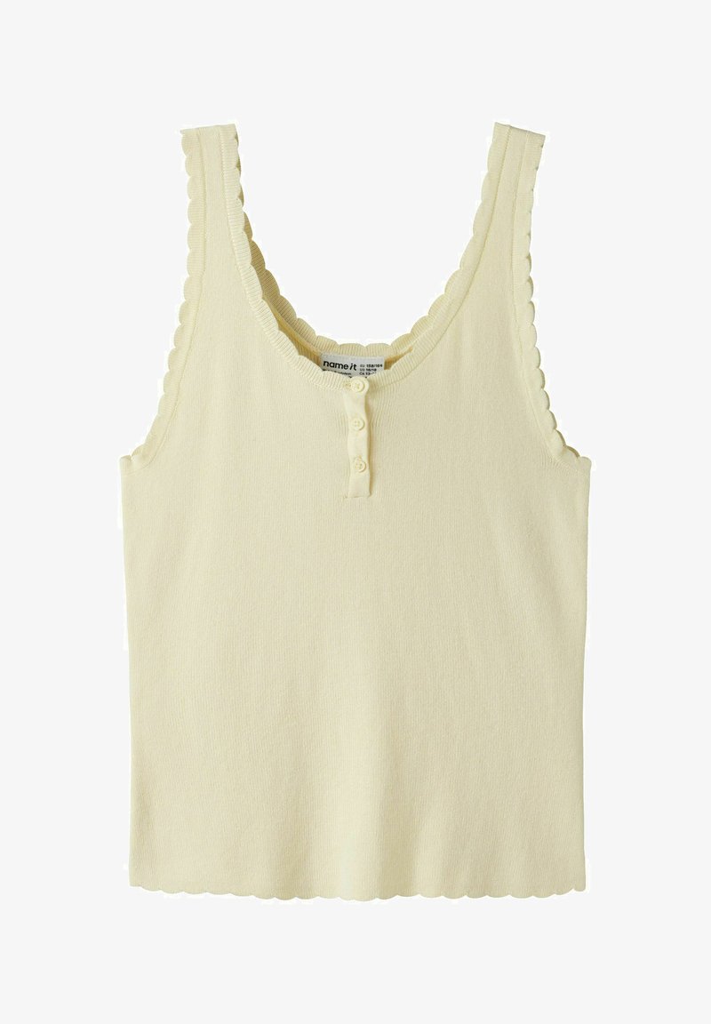 Roomkleurige mouwloze geribde gebreide top met geschulpte randen en een drieknopsbies bij de halslijn.