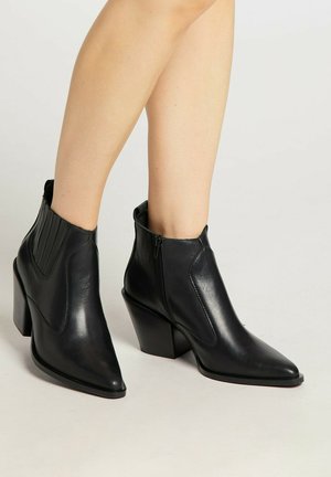 Biker-/cowboynilkkurit - schwarz