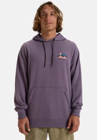 Purple hooded sweatshirt with a front kangaroo pocket, featuring a mountain graphic in orange and blue, and black drawstrings with yellow accents.