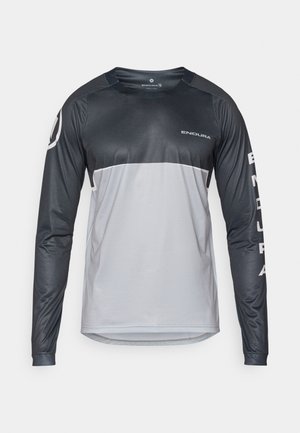 Pikema varrukatega jalgrattasärk musta ja halli värviga, millel on ümmargune kaelus, sile tekstuur ning logo aktsendid rinnal ja varrukal.