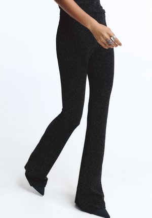 SHIMMERY FLARED - Nadrágok - black