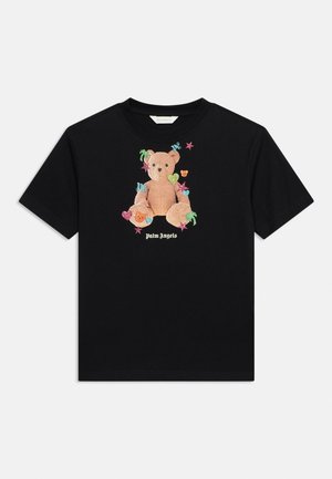 T-shirt noir à manches courtes avec un ours en peluche central entouré d'étoiles colorées, de cœurs et de petites icônes, avec le texte « Palm Angels » en dessous.