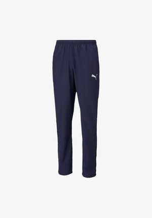 Pantaloni sportivi della Marina realizzati in materiale leggero. Presentano un elastico in vita e un logo bianco sulla parte inferiore della gamba sinistra. Texture liscia.