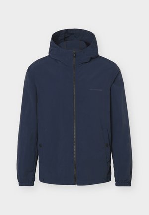 Tmavomodrá bunda s kapucňou, predným zipsom, elastickými manžetami a dvoma bočnými vreckami so cvokmi.