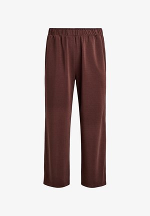 Brune løstsiddende bukser med elastisk talje, lige ben og glat stoftekstur, vist mod en hvid baggrund.