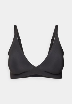 Melns bezvadu krūšturis ar dziļu V-veida izgriezumu, gludu tekstūru un regulējamām siksnām. Bez polsterējuma un stīpiņām, piemērots ikdienas nēsāšanai.