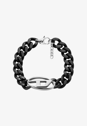 Black chain bracelet featuring large links and a silver clasp with a unique oval logo accent. Smooth texture with a glossy finish.
