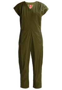 Mono verde olivo con mangas cortas tipo cap sleeve, escote en V, cremallera frontal y dos bolsillos laterales. Tejido ligero y texturizado.