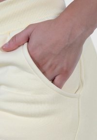 Smilodox CASSANDRA - Trainingsbroek - gelb