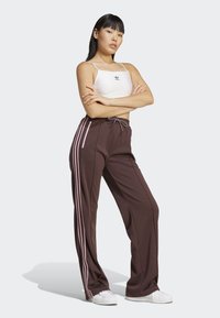 adidas Originals MONTREAL  - Spodnji deli trenirk - shadow brown